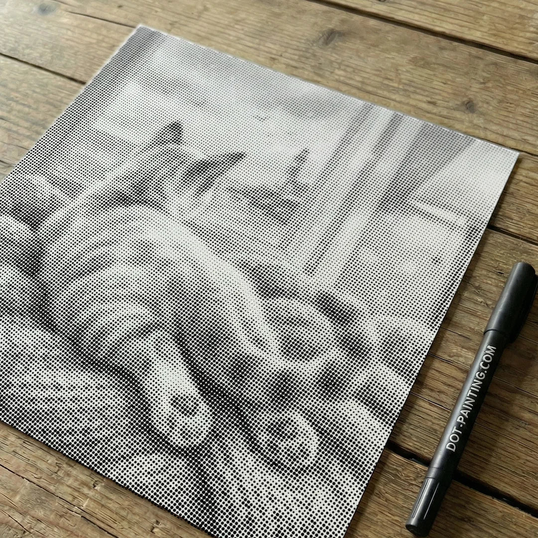 Katt tittar på fågelprickmålning
